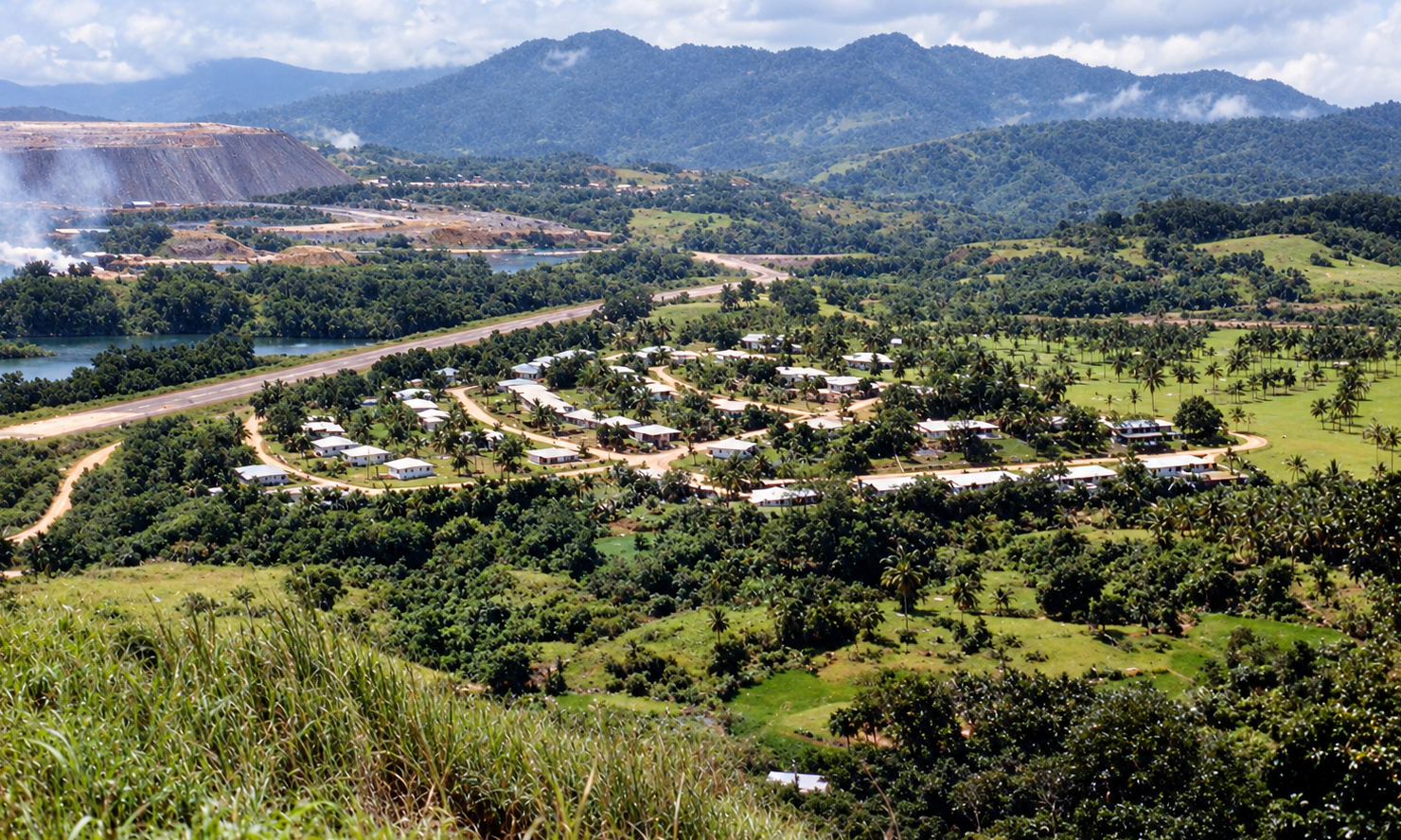 The Marcopper townsite and airstrip surrounded by green hills.