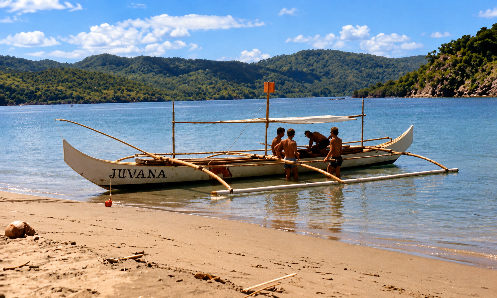 People gathered around the outrigger boat Juvana in the shallow water beside the beach.